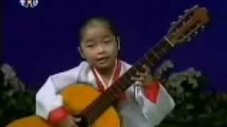 Little North Korean Girl Playing Guitar